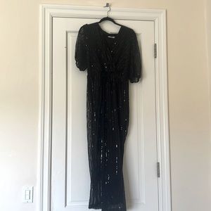 This is a black jump suit I only wore it once for a high school dance